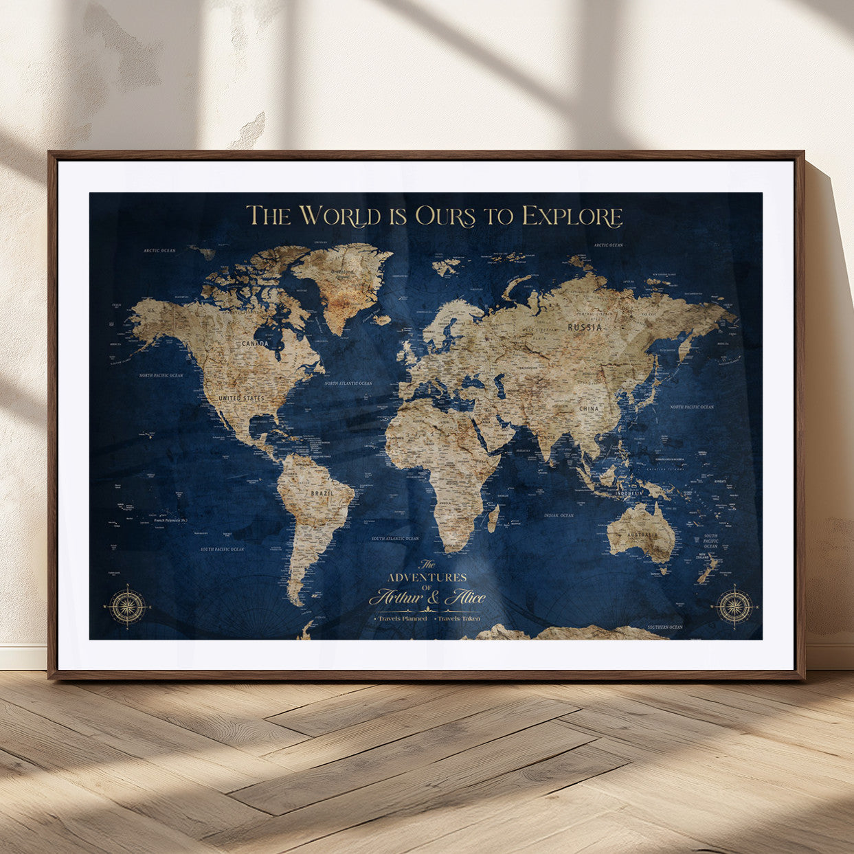 54782997-MGC-FP-36x24_Walnut-The World is Ours to Explore Wall Art – Blue World Map Canvas Print, Adventure Travel Decor for Home, Office or Living Room,
