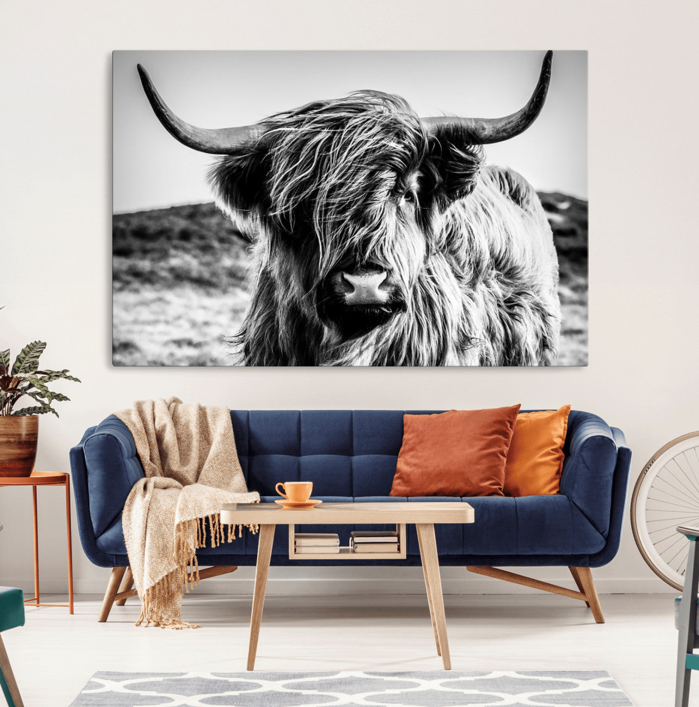 36979-MGV-CV-36X24-Striking black-and-white portrait of a Highland cow with flowing fur and majestic horns, perfect for rustic and elegant home or