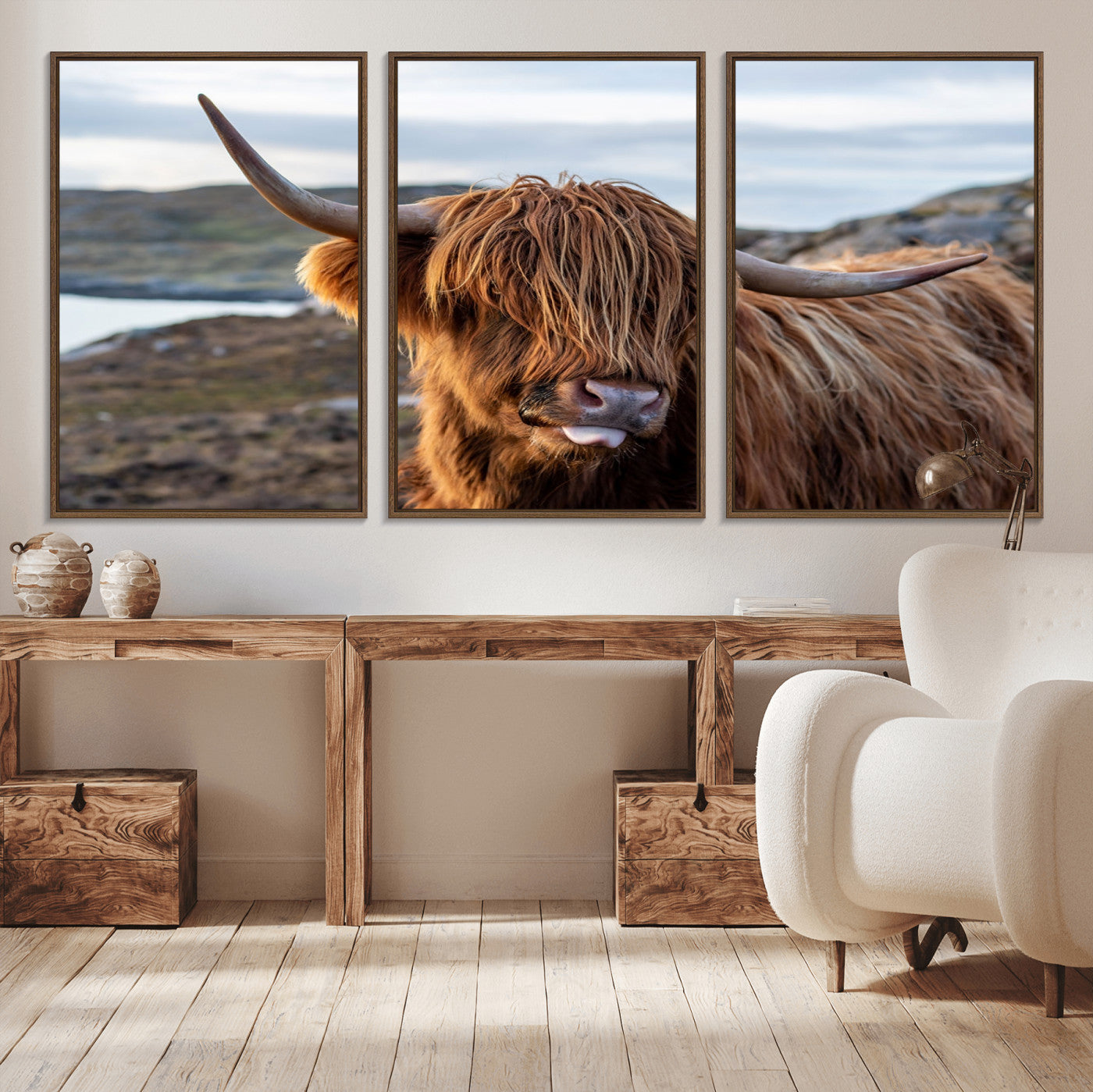 71222-MGV-FC-60X30-3P_Walnut-A playful Highland cow with shaggy fur sticks out its tongue, set against a rugged landscape — perfect for quirky home or office