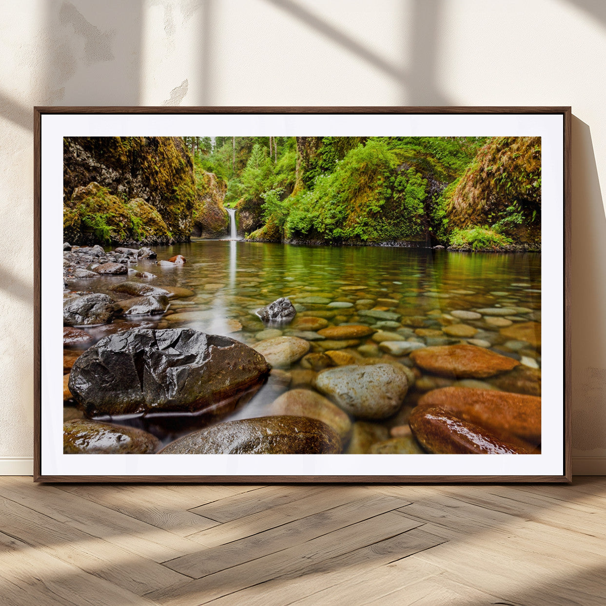 98096-MGC-FP-36x24_Walnut-Serene River Waterfall Nature Photo – Calm Clear Water, Vibrant Green Forest and Smooth Stones Landscape Wall Art for Home or