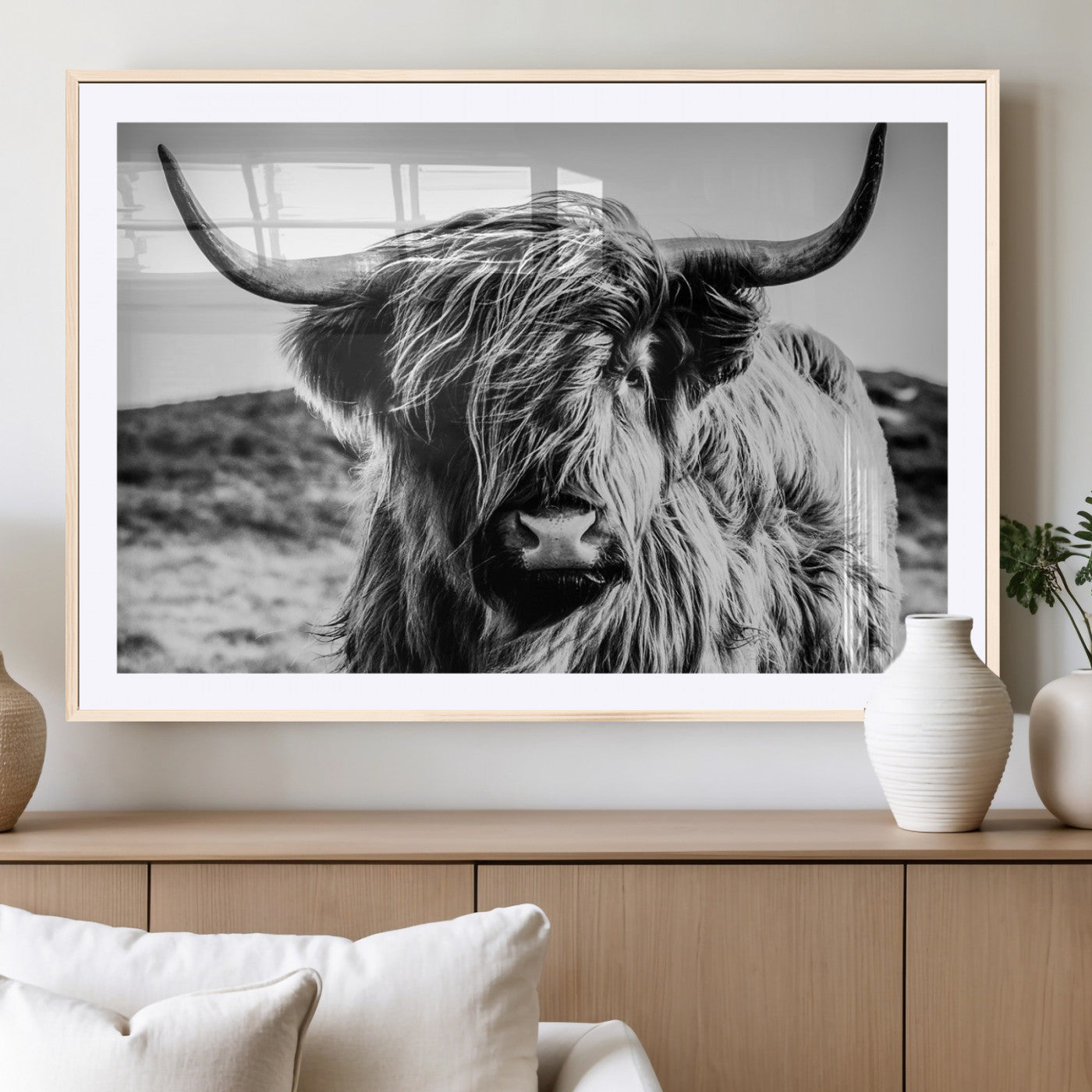36979-MGC-FP-36x24_Natural-Striking black-and-white portrait of a Highland cow with flowing fur and majestic horns, perfect for rustic and elegant home or