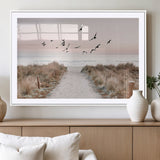 34632598-MGC-FP-36x24_White-Beach Pathway Wall Art – Coastal Canvas Print with Sandy Trail, Flying Birds and Pastel Sky, Serene Ocean Landscape Photography