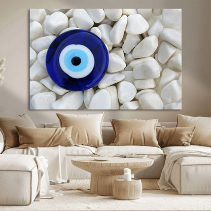 48883-MGV-CV-36X24-Evil Eye Wall Art – Deep Blue Symbol of Presence and Calm on White Stones, Subtle Spiritual Decor for Entryway, Studio, Office or