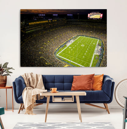 23655234-MGV-CV-36X24-Lambeau Field Stadium Wall Art – American Football Night Game Canvas Print with Packed Crowd and Lights – Sports Decor for Man