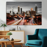 59097239-MGV-CV-36X24-City Skyline Wall Art – Modern Black and White Night Canvas Print with Red Light Trails, Urban Landscape Decor for Living Room or