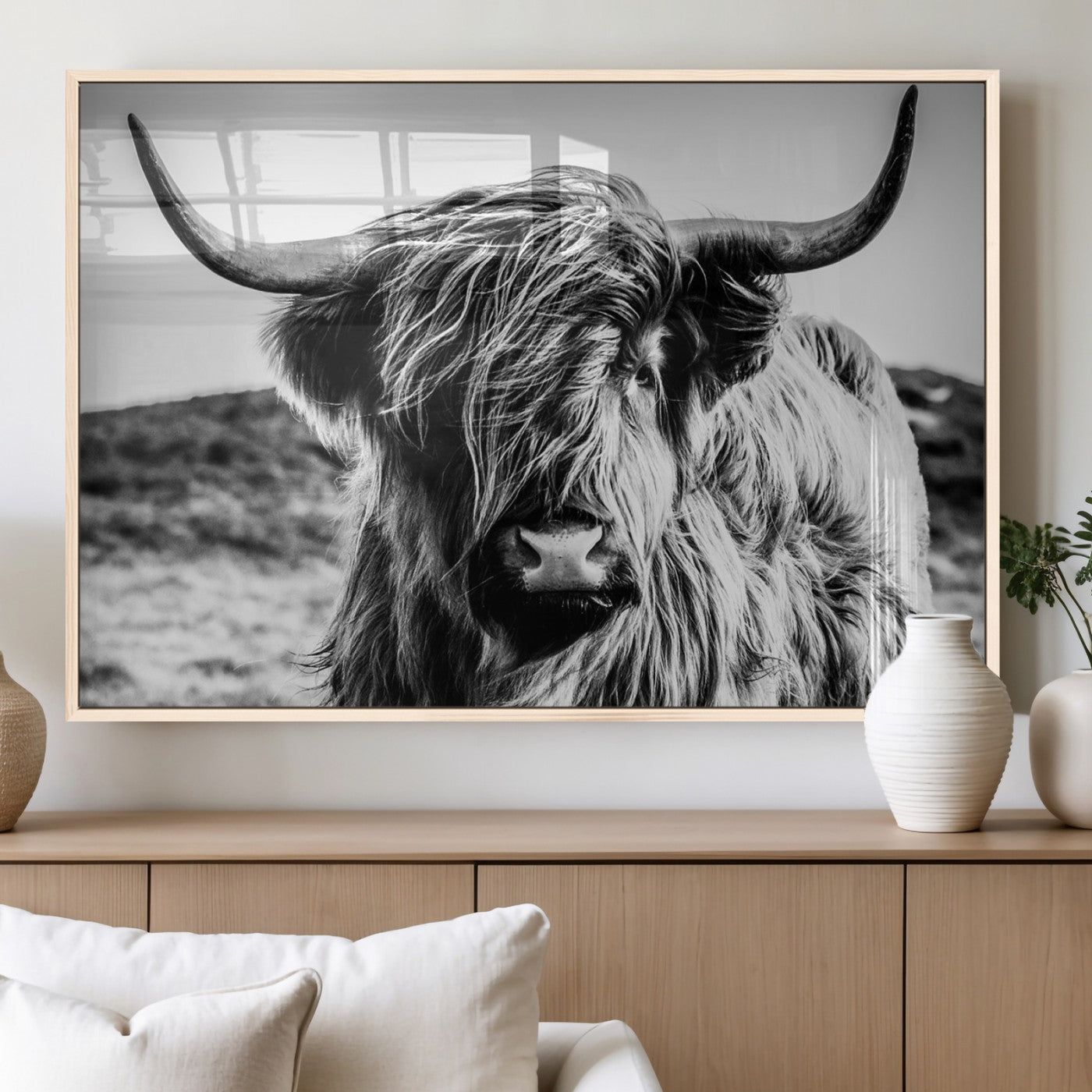36979-MGV-FP-36X24-3P_Natural-Striking black-and-white portrait of a Highland cow with flowing fur and majestic horns, perfect for rustic and elegant home or