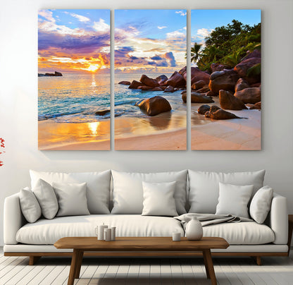 43209-MGV-CV-48X32-3P-Tropical Beach Sunset Wall Art – Golden Ocean Waves and Palm Trees with Rocky Shore Canvas Print, Coastal Seascape Decor for