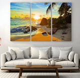 26181-MGV-CV-36X24-Golden Tropical Sunset Beach Wall Art – Ocean Canvas Print with Palm Trees and Rocks, Coastal Paradise Decor for Living Room or