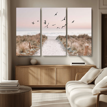 34632598-MGV-CV-36X24-Beach Pathway Wall Art – Coastal Canvas Print with Sandy Trail, Flying Birds and Pastel Sky, Serene Ocean Landscape Photography