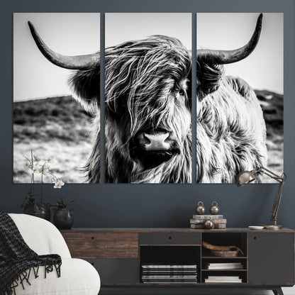 36979-MGV-CV-36X24-Striking black-and-white portrait of a Highland cow with flowing fur and majestic horns, perfect for rustic and elegant home or