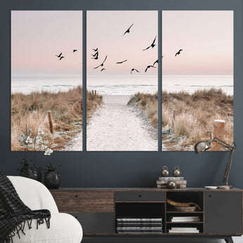 34632598-MGV-CV-36X24-Beach Pathway Wall Art – Coastal Canvas Print with Sandy Trail, Flying Birds and Pastel Sky, Serene Ocean Landscape Photography