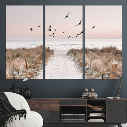 34632598-MGV-CV-36X24-Beach Pathway Wall Art – Coastal Canvas Print with Sandy Trail, Flying Birds and Pastel Sky, Serene Ocean Landscape Photography