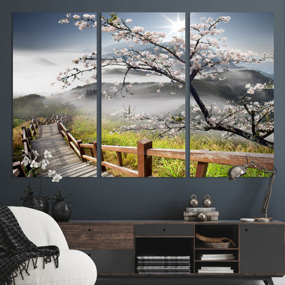 34632598CRY-MGV-CV-36X24-Cherry Blossom Wall Art – Scenic Asian Landscape Canvas Print with Wooden Walkway, Misty Mountains and Sunrise, Serene Nature