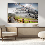 34632598CRY-MGV-FC-36X24_Natural-Cherry Blossom Wall Art – Scenic Asian Landscape Canvas Print with Wooden Walkway, Misty Mountains and Sunrise, Serene Nature