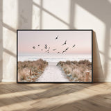 34632598-MGV-FC-36X24_Black-Beach Pathway Wall Art – Coastal Canvas Print with Sandy Trail, Flying Birds and Pastel Sky, Serene Ocean Landscape Photography