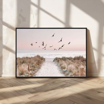 34632598-MGV-FC-36X24_Black-Beach Pathway Wall Art – Coastal Canvas Print with Sandy Trail, Flying Birds and Pastel Sky, Serene Ocean Landscape Photography