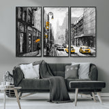 32362-MGV-FC-48X32-3P_Black-NYC Street Wall Art – Black and White Cityscape with Yellow Taxis and Umbrella Canvas Print, Urban Home Decor for Living Room or