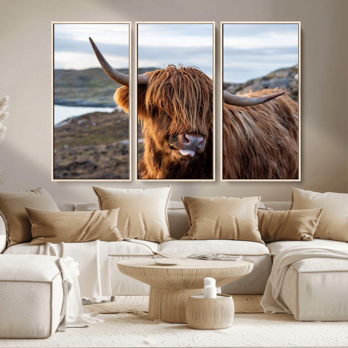 71222-MGV-CV-36X24-A playful Highland cow with shaggy fur sticks out its tongue, set against a rugged landscape — perfect for quirky home or office