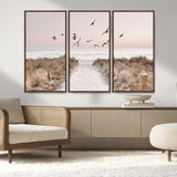 34632598-MGV-FC-48X32-3P_Walnut-Beach Pathway Wall Art – Coastal Canvas Print with Sandy Trail, Flying Birds and Pastel Sky, Serene Ocean Landscape Photography