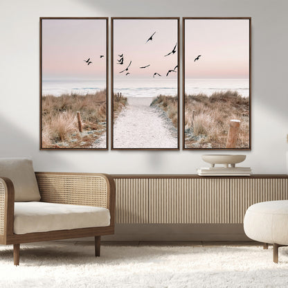 34632598-MGV-FC-48X32-3P_Walnut-Beach Pathway Wall Art – Coastal Canvas Print with Sandy Trail, Flying Birds and Pastel Sky, Serene Ocean Landscape Photography