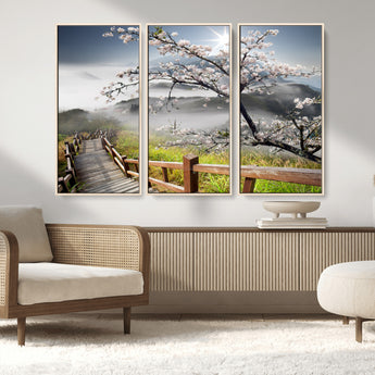 34632598CRY-MGV-FC-48X32-3P_Natural-Cherry Blossom Wall Art – Scenic Asian Landscape Canvas Print with Wooden Walkway, Misty Mountains and Sunrise, Serene Nature