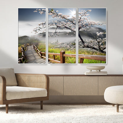 34632598CRY-MGV-FC-48X32-3P_White-Cherry Blossom Wall Art – Scenic Asian Landscape Canvas Print with Wooden Walkway, Misty Mountains and Sunrise, Serene Nature