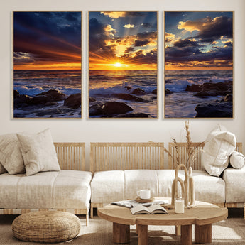 35900590-MGV-FC-60X30-3P_Natural-Ocean Sunset Wall Art – Vivid Seascape Canvas Print with Sunburst Sky, Crashing Waves and Rocky Shore, Dramatic Coastal