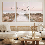34632598-MGV-FC-60X30-3P_Natural-Beach Pathway Wall Art – Coastal Canvas Print with Sandy Trail, Flying Birds and Pastel Sky, Serene Ocean Landscape Photography