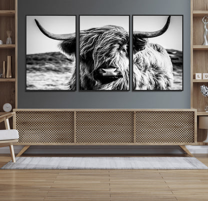 36979-MGV-FC-60X30-3P_Black-Striking black-and-white portrait of a Highland cow with flowing fur and majestic horns, perfect for rustic and elegant home or