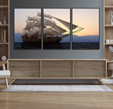 31270610-MGV-FC-60X30-3P_Black-Sailing Ship Wall Art – Sunset Seascape Canvas Print with Tall Ship at Sea, Nautical Ocean Decor for Living Room, Office, or