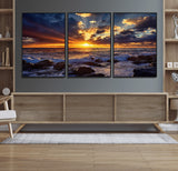 35900590-MGV-FC-60X30-3P_Black-Ocean Sunset Wall Art – Vivid Seascape Canvas Print with Sunburst Sky, Crashing Waves and Rocky Shore, Dramatic Coastal