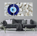 48883-MGV-FC-60X30-3P_White-Evil Eye Wall Art – Deep Blue Symbol of Presence and Calm on White Stones, Subtle Spiritual Decor for Entryway, Studio, Office or