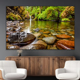 98096-MGV-CV-36X24-Serene River Waterfall Nature Photo – Calm Clear Water, Vibrant Green Forest and Smooth Stones Landscape Wall Art for Home or