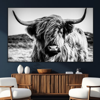 36979-SEG-FC-51X34_Oversize_Oversize-Striking black-and-white portrait of a Highland cow with flowing fur and majestic horns, perfect for rustic and elegant home or