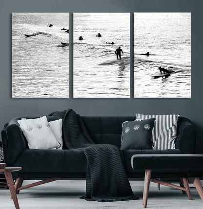 68018616-MGV-CV-60X30-3P-Black and White Surf Photography Print – Minimalist Ocean Wall Art, Surfers Riding Waves, Coastal Beach Decor for Modern Home or
