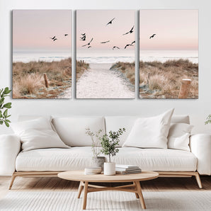 34632598-MGV-CV-36X24-Beach Pathway Wall Art – Coastal Canvas Print with Sandy Trail, Flying Birds and Pastel Sky, Serene Ocean Landscape Photography