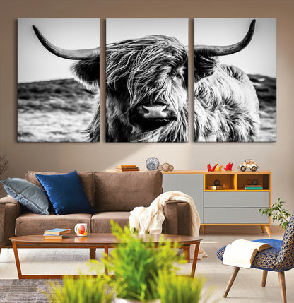 36979-MGV-CV-36X24-Striking black-and-white portrait of a Highland cow with flowing fur and majestic horns, perfect for rustic and elegant home or